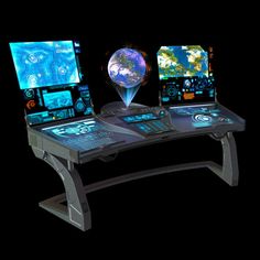 a computer desk topped with three monitors and a globe on it's standup