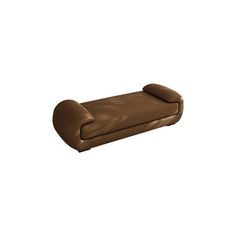 a brown leather couch sitting on top of a white floor