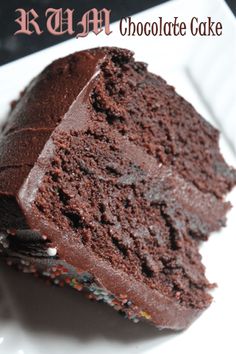 a piece of chocolate cake sitting on top of a white plate