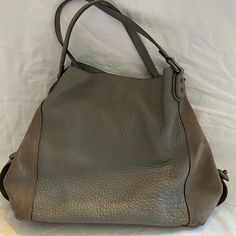 Coach Turnlock Edie Grey Leather Shoulder Bag - Used 2-3x - Brand New! Leather Bags With Silver-tone Hardware For Daily Use, Leather Shoulder Bag With Silver-tone Hardware For Daily Use, Leather Shoulder Bag With Silver-tone Hardware For Errands, Coach Satchel With Gunmetal Hardware, Coach Satchel Shoulder Bag With Gunmetal Hardware, Coach Textured Leather Everyday Shoulder Bag, Coach Leather Hobo Bag For Shopping, Leather Hobo Bag With Silver-tone Hardware, Everyday Coach Textured Leather Shoulder Bag