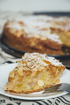 a piece of pie sitting on top of a white plate