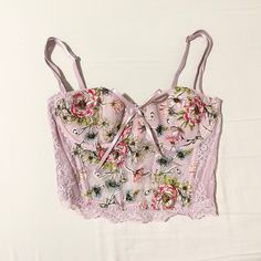 Victoria’s Secret Coquette Dream Angels Floral Corset Bustier Top Size: 34c New Without Tags. Gorgeous Lace Detailing, Floral Embroidery, Ribbon Front. Boning For Structure. Lightly Lined Cups, Hook And Eye Closure. Pink Underwire Summer Top, Victoria Secret Corset, Feminine Underwire Tops For Summer, Feminine Underwire Top For Spring, Victoria's Secret Feminine Bra Friendly Tops, Victoria's Secret Feminine Bra-friendly Tops, Floral Corset, Black Lace Bralette, White Bras