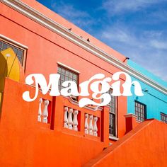 an orange building with the word magen painted on it