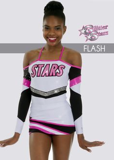 a woman wearing a white and black cheerleader outfit with stars on the chestline