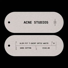 two tags that say acne studios and slim fit t - shirt optic white