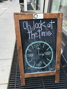 a chalkboard sign with the words on look at the time