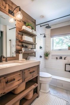 a bathroom with a sink, toilet and bathtub