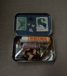 two tins filled with different types of items