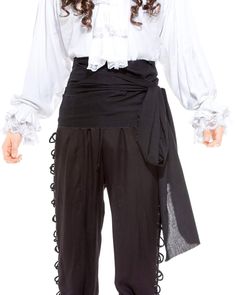 a woman wearing black pants and a white shirt with ruffles on the bottom