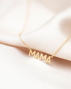 In celebration of all the great mothers around the world, treat the mom in your life to this piece of jewelry they deserve with this gold mama necklace. A perfect way to express what means most to you! Available in 14K yellow, rose or white gold Letters measure about 5mm in height Necklace total length is measured from end to end Dainty minimalist everyday necklace 14k Gold Charm Necklace For Mom, 14k Gold Charm Necklaces For Wedding And Mother's Day, Gold Plated Jewelry Gift For Mother's Day, Delicate Yellow Gold Charm Necklace For Mother's Day, Meaningful Gold Birthstone Necklace, Meaningful Gold Necklace For Anniversary, Elegant Nameplate Charm Necklace For Mother's Day, Mother's Day Rose Gold 14k Gold Charm Necklaces, Yellow Gold Jewelry Gift For Mother's Day