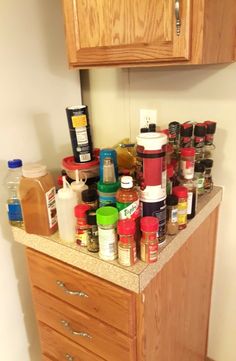 the kitchen counter is full of spices and condiments