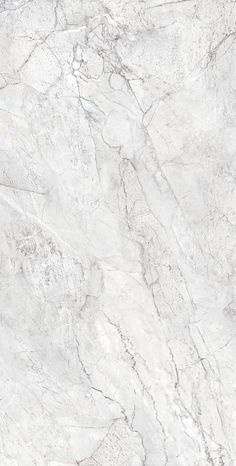 a white marble textured surface with grey veiners