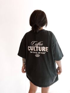 This Coffee Culture Black Graphic Tee is made of 100% garment-dyed cotton for a relaxed, comfortable fit. Upgrade your casual wardrobe with the exclusive style of this statement tee, featuring coffee culture and the iconic statement, "no coffee, no work". Wear it oversized for maximum impact. 100% garment dyed cotton Model has sized up to an XL for an oversized fit. Coffee Tshirt Design, Tupac Shirt, No Coffee, Black Graphic Tee, Coffee Culture, Oversized Graphic Tee, Black Graphic Tees, Coffee Shirts