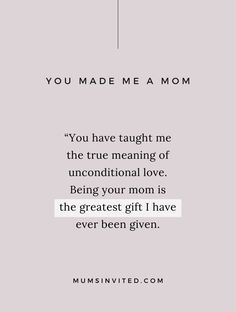 the quote you made me a mom is shown in black and white on a gray background