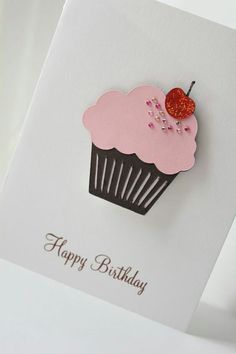 a birthday card with a pink cupcake on it