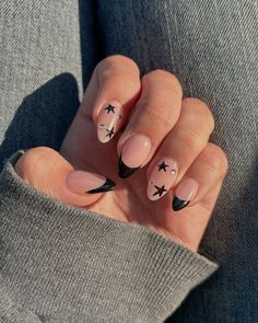 Sparkle Nail Art Designs, Nails To Get With A Black Dress, Black Nail With Design, Milky White Nails Black Design, Black Star Nail Designs, Nails Winter Black, Conan Gray Nails Inspired, Black French Tip Nails With Stars, Almond Nails With Stars