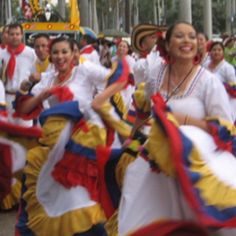 a group of people that are standing in the street with some kind of costume on