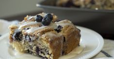 a slice of blueberry coffee cake on a plate