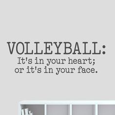 the volleyball wall decal is shown in black on a gray background, it's in your heart or it's in your face