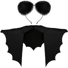 a bat costume with black wings and fur balls on it's headbands