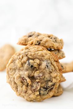 three oatmeal cookies stacked on top of each other with one cookie in the middle