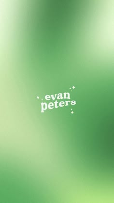 a blurry green background with the words evan peters written in white on it's left side