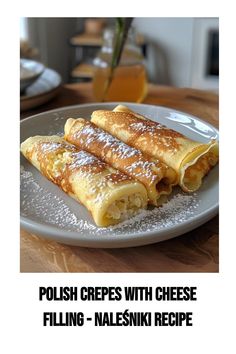 polish crepes with cheese filling on a white plate