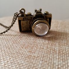 Vintage Style Camera Necklace. Antiqued Brass Finish. 11" Necklace, Includes Charm. 3 1/2" Extender. Charm Is 1" In Depth, 1 1/2" Wide, 1" Height. Never Worn. Costume Jewelry. Camera Necklace, Vintage Necklace, Costume Jewelry, Antique Brass, Womens Jewelry Necklace, Vintage Inspired, Vintage Fashion, Women Jewelry, Jewelry Necklaces