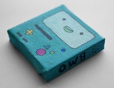 a small blue box with an image of a cartoon character on the front and side