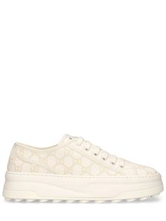 52mm Heel. Off-white canvas with GG embroidered upper. Off-white trim. Front lace-up closure. Logo details. Gucci Tennis 1977 label . All over pattern placement may vary. Rubber platform sole. Includes additional pair of laces Gucci Heels, All Over Pattern, Ski Accessories, Loafer Mules, Flat Espadrilles, Swim Accessories, Heeled Loafers, Shearling Jacket, White Trim