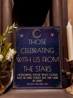 a blue sign that says those celebrating with us from the stars