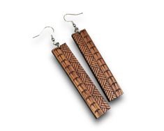 pair of wooden earrings on white background