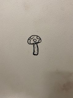 a drawing of a mushroom on the wall