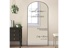 an arched mirror with the words we came to love story written on it