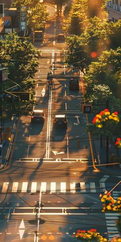 an aerial view of a city street at sunset