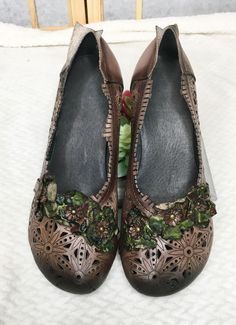 Our beautiful Fairy Shoes are going to make you feel in your own fairytale, with its intricate design and flowers along the top. You won't be just another maiden, because these beautiful shoes are going to make you step up in the shoe game. -Leather upper and rubber sole -Size up if you are a (1/2) size. -2" heel Casual Shoes Outfit Women, Aesthetic Shoe Collection, Shoes Collection Aesthetic, Shoe Collection Aesthetic, Womans Summer Outfits, Womans Outfit, Fairy Slippers, Organization Shoes, Aesthetic Shoe