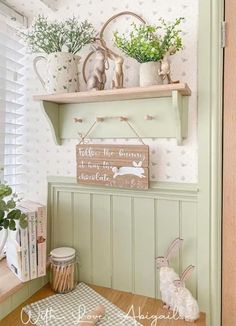 a shelf with some plants on top of it