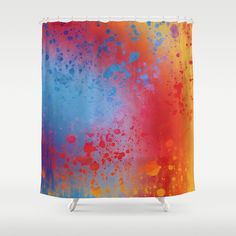 an abstract shower curtain with colorful paint splattered on the side and bottom half