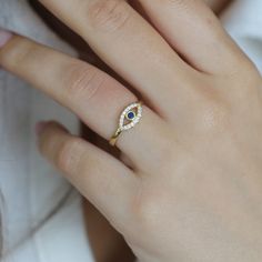 14k Gold Evil Eye Ring,Dainty Stackable Ring, Handmade Jewelry,Simple Ring,Minimalist Ring ❤️Minimalist look and dainty design❤️ ABOUT PRODUCTS; Handmade with 14k Gold,925 Solid Sterling Silver We have color options. Silver Gold Rose gold Comes with a stylish gift-ready elegant jewelry box ** ANY PROBLEMS AND PLEASE CONTACT ME IN ORDER CONTENT, THANK YOU ** Evil Eye Ring Jewelry Gift, Elegant Evil Eye Rings As Gift, Elegant Evil Eye Rings, Yellow Gold Evil Eye Rings As Gifts, Adjustable Evil Eye Ring Jewelry, Evil Eye Ring Silver, Evil Eye Ring Gold, Sapphire Eyes, Silver Eye