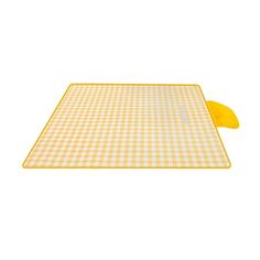 a yellow and white checkered cutting board