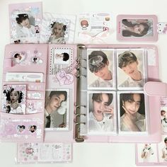 an open pink album with pictures of people on it and other items in the pages