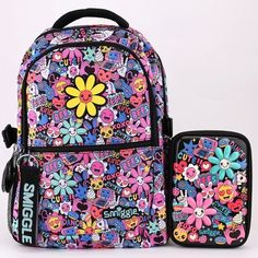 The perfect backpack for any flower fan! From high-end Australian brand Smiggle, this backpack will stand the test of time thanks to high quality materials and details. Side pockets perfect for hauling water bottles and accessories. Front zip pocket and main enclosure with double zippers. Reinforced top loop for carrying and hanging. Extra thick lined shoulder straps for comfort and easy hauling. Internal compartment for up to 15 in. laptop or i-pad. Black backpack with multi-colored BFF, flowers, and more multi-colored print. Giant smiling flower across the front. Large capacity backpack: 16.6” x 13” x 6” Water bottle: 650ml Grab the backpack alone or as a set with the pencil case. Good things take time. Quicker shipping: this backpack ships directly from our overseas warehouse and will a Smiggle Backpack, Smiling Flower, Student Supplies, Tools Drawing, Bedroom Stuff, Backpack Accessories, Women's Shoes Accessories, Pencil Box, Backpacking Gear