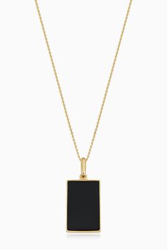 What better way to express your side of balance than with our Tag Me Pendant Necklace. A White Mother of Pearl Or Black Onyx Stone, representing Ying Yang, is encased in a solid gold tag, which hangs off a cable chain. Layer it or wear it solo, the choice is yours. Metal: 14 Karat Yellow Gold Dimensions: 12mm Tag Width, 24mm Tag Length Length: 18 Inches Length, Adjustable to 16 Inches Stone: Genuine White Mother of Pearl or Black Onyx Origin: Crafted in Vicenza, Italy Black Pendant Necklace, Vicenza Italy, Gold Tag, Necklace Gold Chain, Outfits Jewelry, Pendant Necklace Gold, Jewelry Nails, Black Onyx Stone, The Choice Is Yours