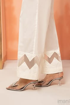 1 PieceOff-White Cambric pants with organza details. Trouser Pant Designs Pakistani, Pant Design With Organza, Indian Pant Design Women, Indian Bottom Wear For Women, Pants Styles Suits Indian, Organza Kurti Pant Designs, Designer Pants For Ladies, Pakistani Pent Dizain, Pant Designs For Suits Pakistani