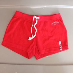 Elastic Waist Red Cotton Sporty Bottoms, Sporty Red Shorts For Loungewear, Red Cotton Shorts For Loungewear, Red Cotton Loungewear Shorts, Sporty Red Cotton Shorts, Red Stretch Cotton Shorts, Casual Tommy Hilfiger Bottoms For Loungewear, Casual Tommy Hilfiger Loungewear Bottoms, Tommy Hilfiger Casual Loungewear Bottoms