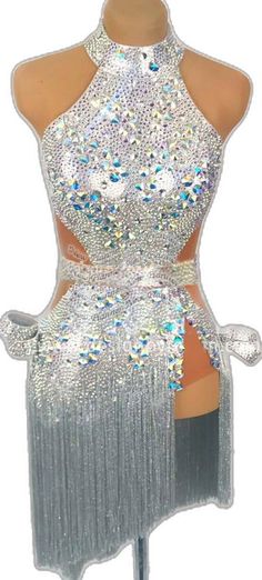 a mannequin with silver sequins on it's chest and back