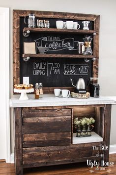 an old dresser is transformed into a coffee bar with chalkboard on the back and shelves above it