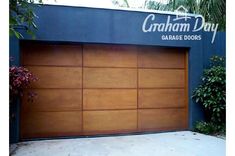 a garage door with the words graham day garage doors on it's front side