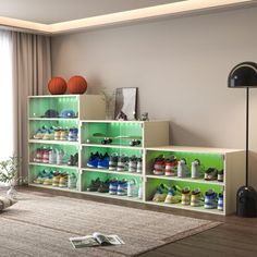 a living room filled with lots of furniture and shelves covered in colorful shoes next to a large window