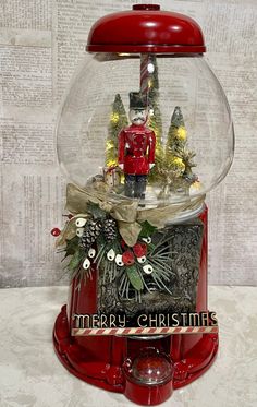 a snow globe with a christmas scene inside